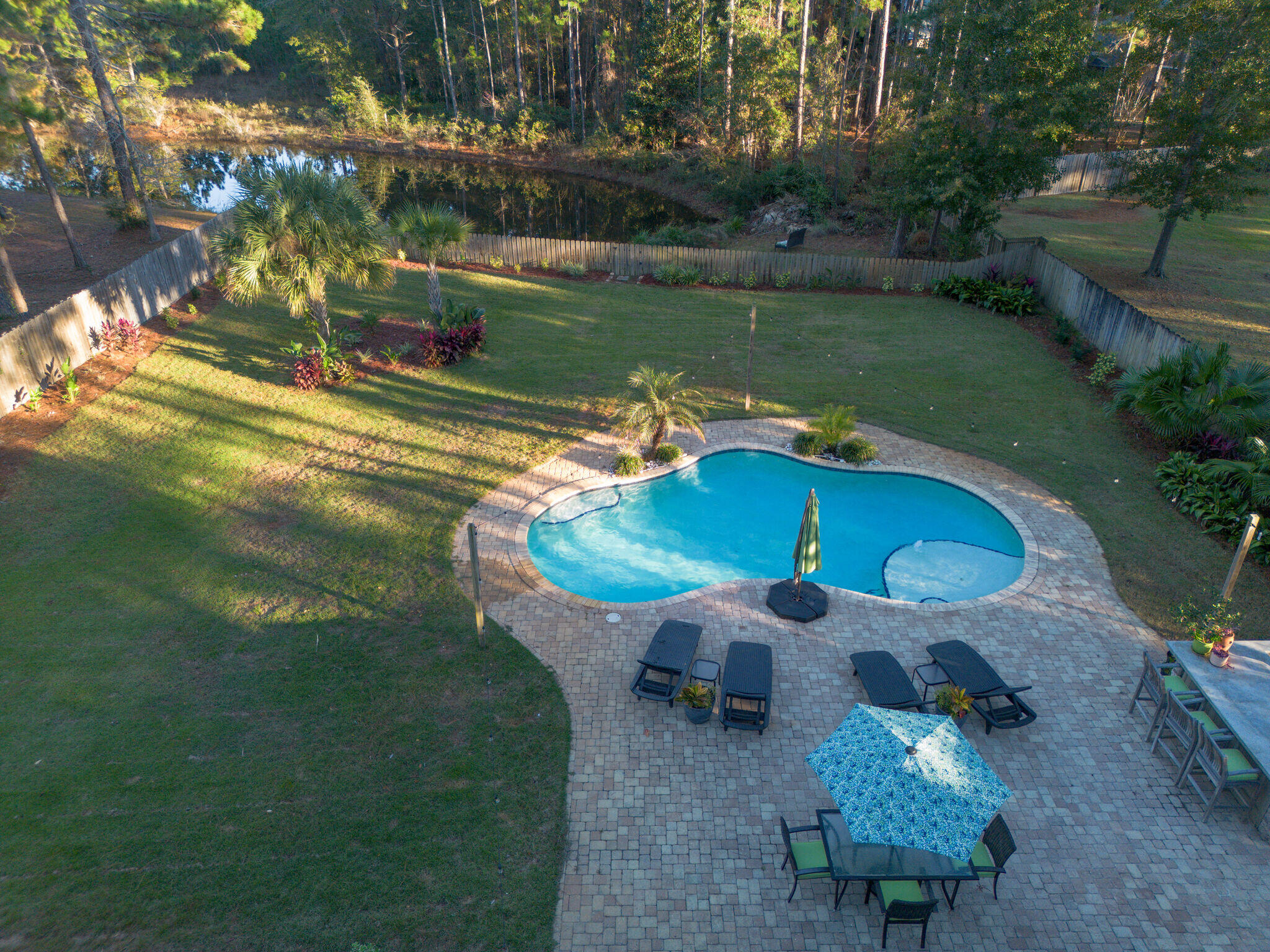 66 Driftwood Point Road Santa Rosa Beach, FL 32459 - Photo 65 of 72 an aerial view of a house with swimming pool a yard and outdoor seating