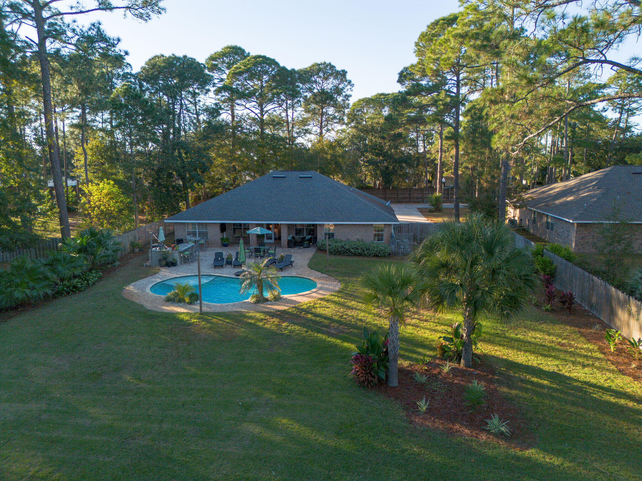 66 Driftwood Point Road Santa Rosa Beach, FL 32459 - Photo 66 of 72 a view of a house with swimming pool and sitting area