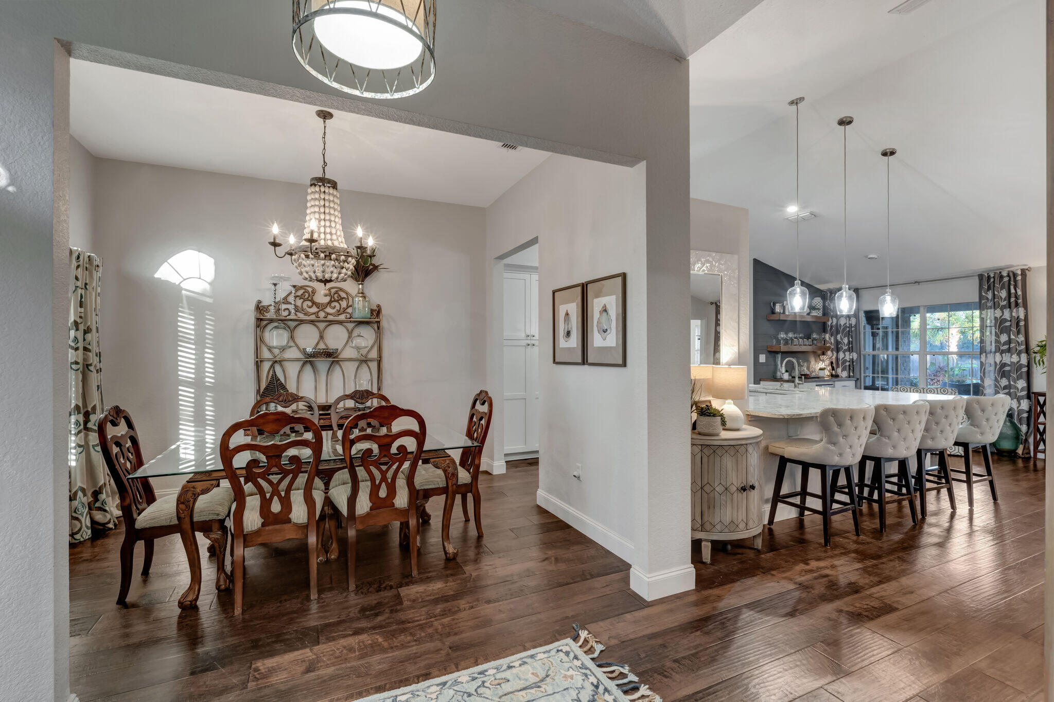 66 Driftwood Point Road Santa Rosa Beach, FL 32459 - Photo 10 of 72 a view of a dining room with furniture and chandelier