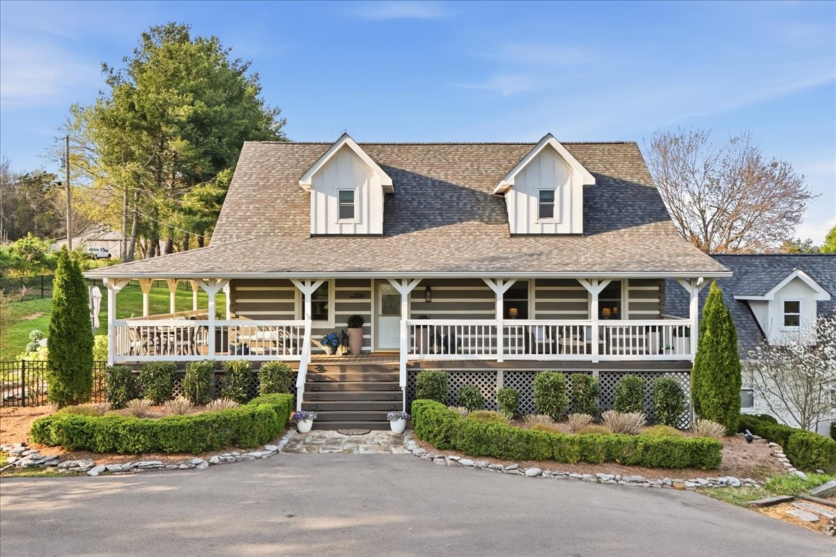 front view of a house with a garden