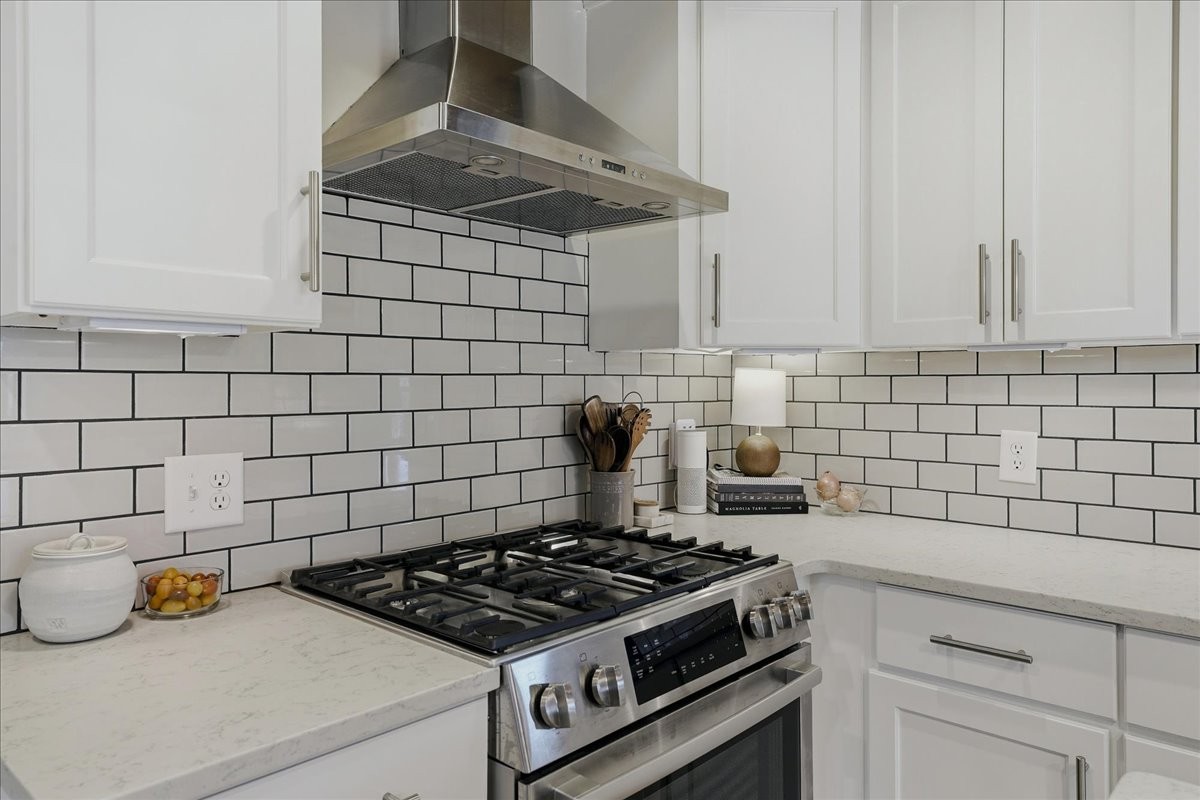 2254 Osburn Road Arrington, TN 37014 - Photo 14 of 55 a kitchen with a stove and cabinets