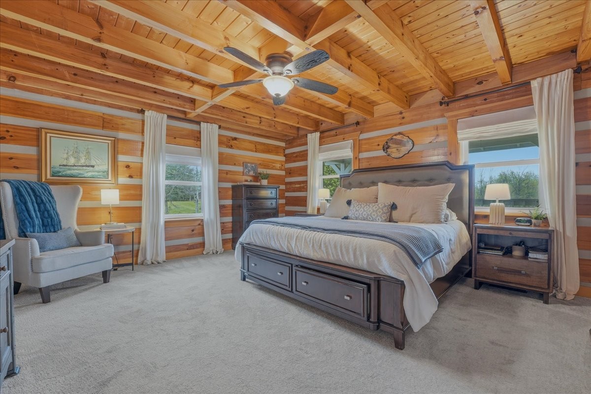 2254 Osburn Road Arrington, TN 37014 - Photo 18 of 55 a bedroom with a bed couch and a view of living room