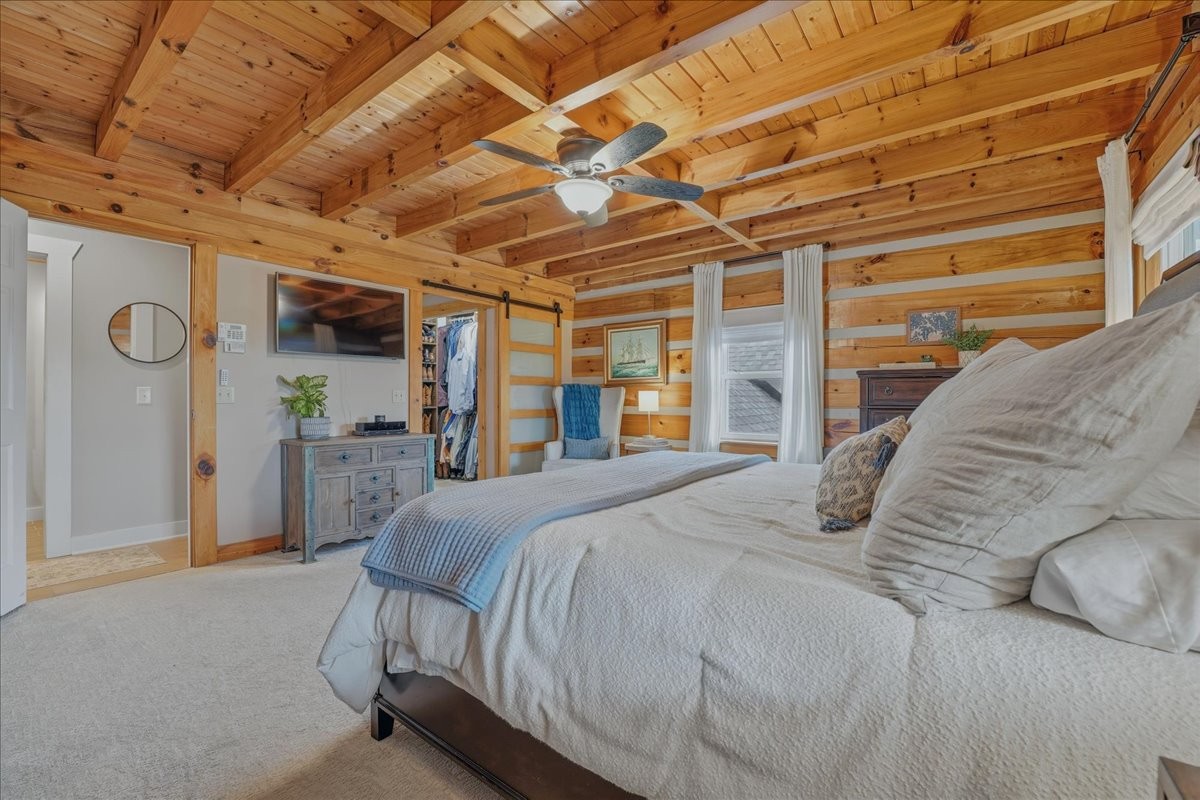 2254 Osburn Road Arrington, TN 37014 - Photo 20 of 55 a spacious bedroom with a bed and a large mirror