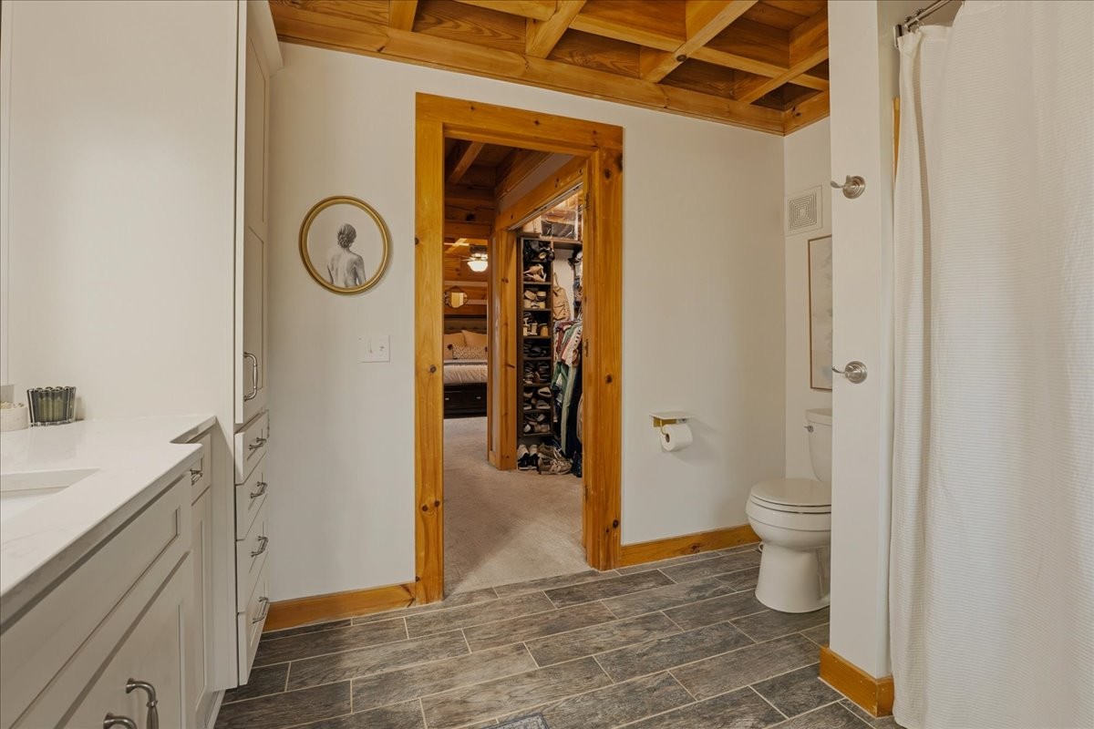 2254 Osburn Road Arrington, TN 37014 - Photo 23 of 55 a view of a hallway with wooden floor and a bathroom