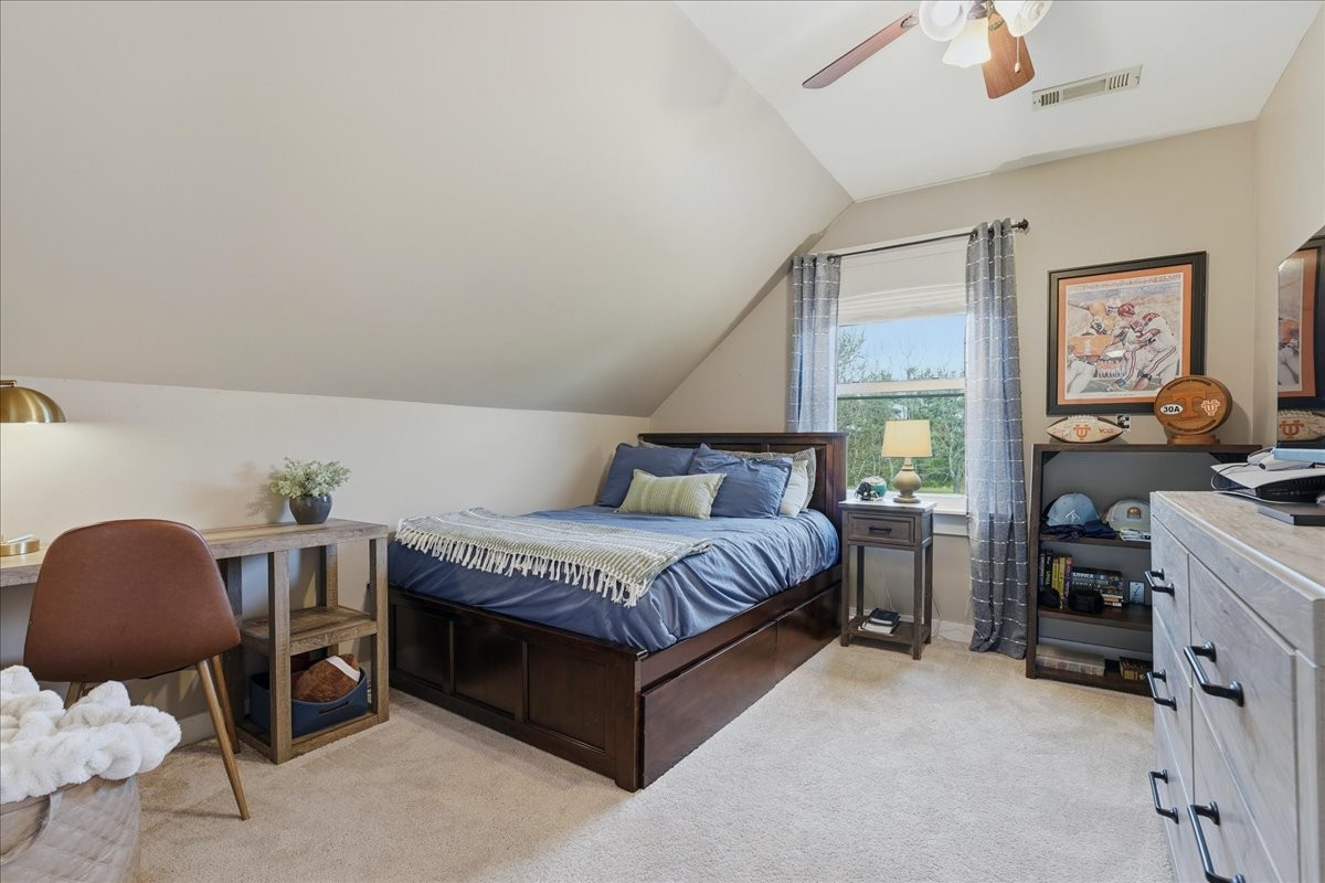 2254 Osburn Road Arrington, TN 37014 - Photo 29 of 55 a spacious bedroom with a bed chair and window