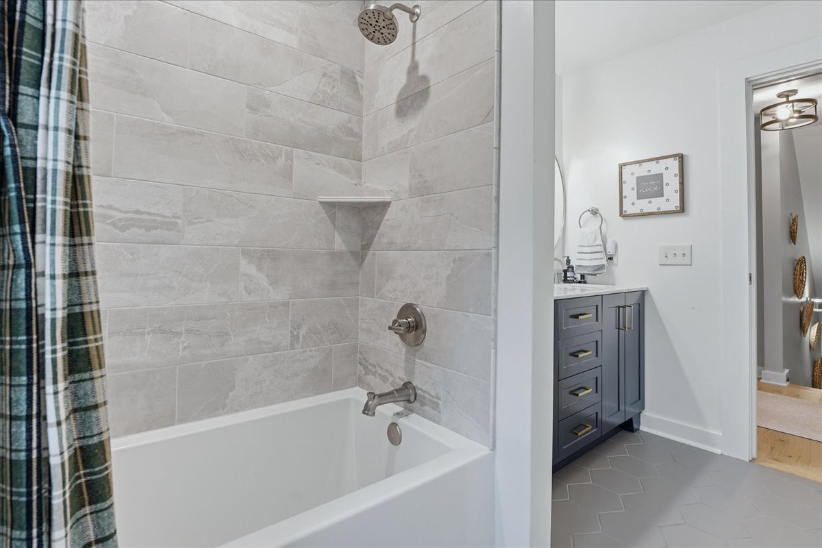 2254 Osburn Road Arrington, TN 37014 - Photo 31 of 55 a bathroom with a bathtub and a shower