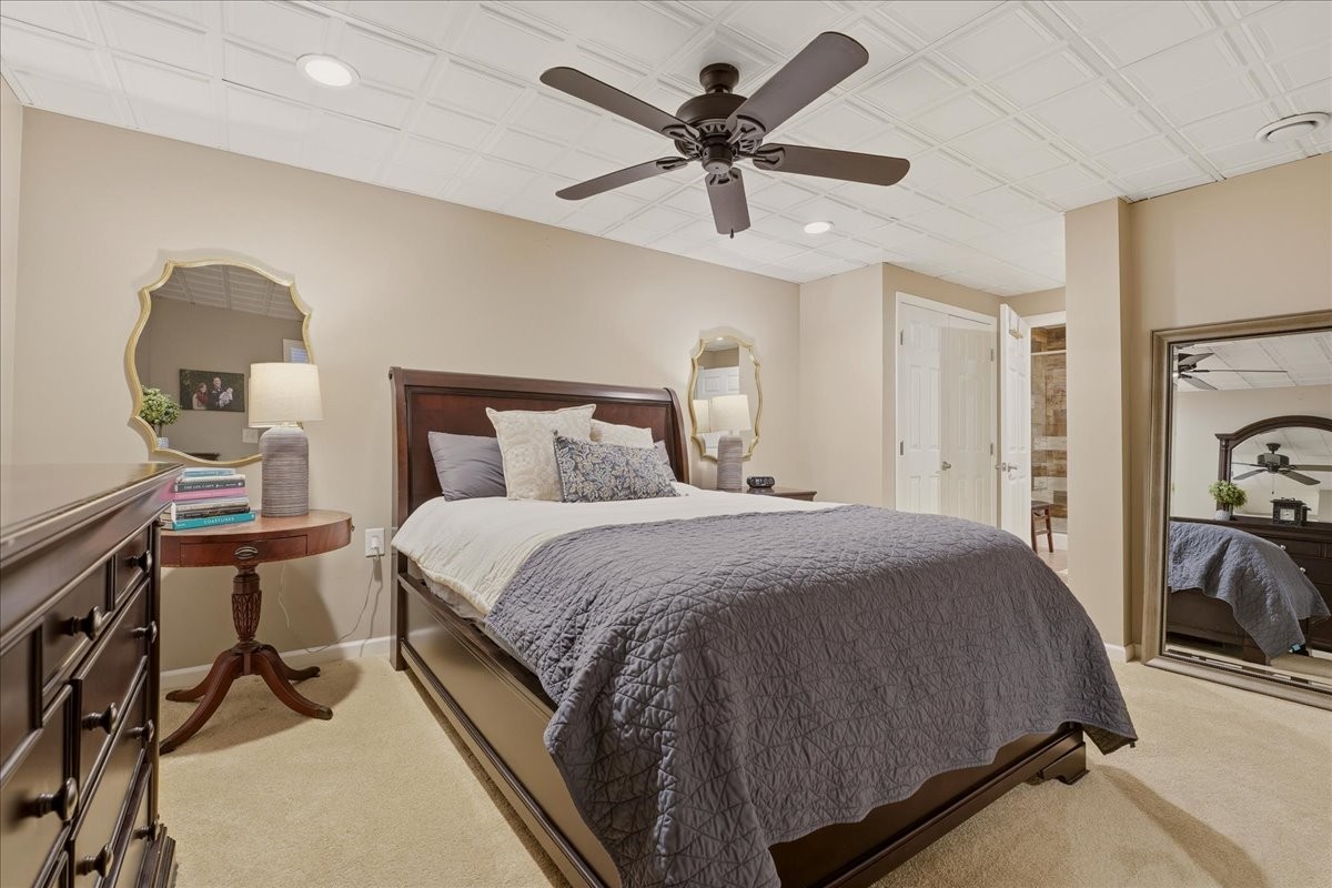 2254 Osburn Road Arrington, TN 37014 - Photo 38 of 55 a bedroom with a bed and a chandelier