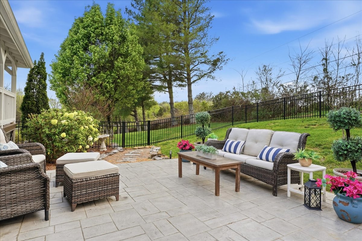 2254 Osburn Road Arrington, TN 37014 - Photo 46 of 55 a backyard of a house with fountain table and chairs