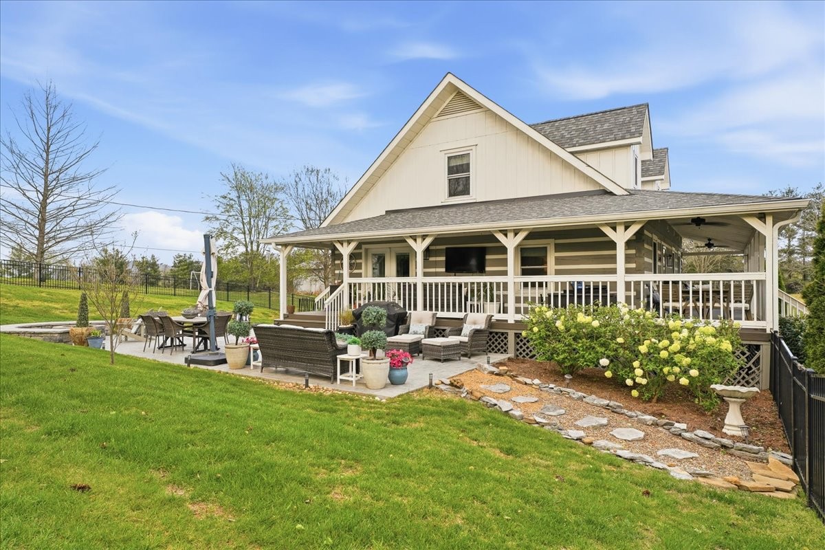 2254 Osburn Road Arrington, TN 37014 - Photo 47 of 55 a view of a house with backyard sitting area and garden