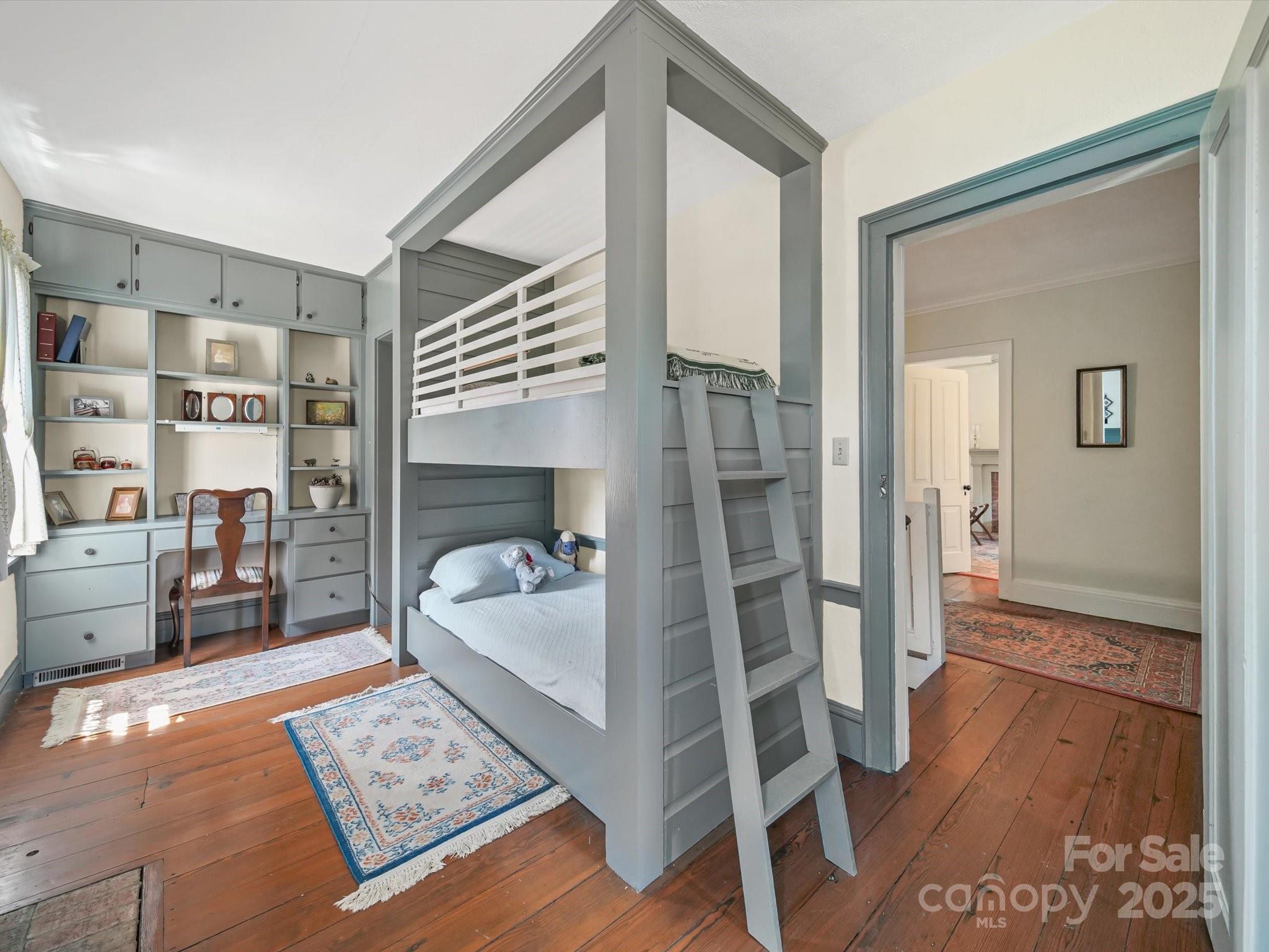 16801 Randalls Ferry Road Norwood, NC 28128 - Photo 24 of 48 a bedroom with furniture and a rug