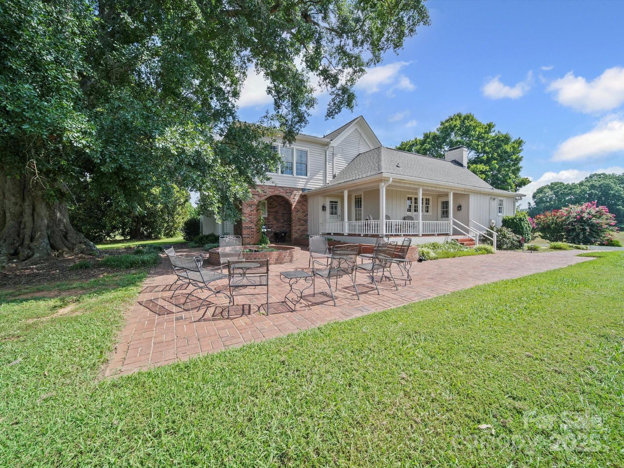 16801 Randalls Ferry Road Norwood, NC 28128 - Photo 34 of 48 a view of a house with a yard