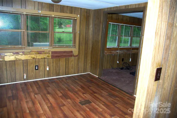 an empty room with windows