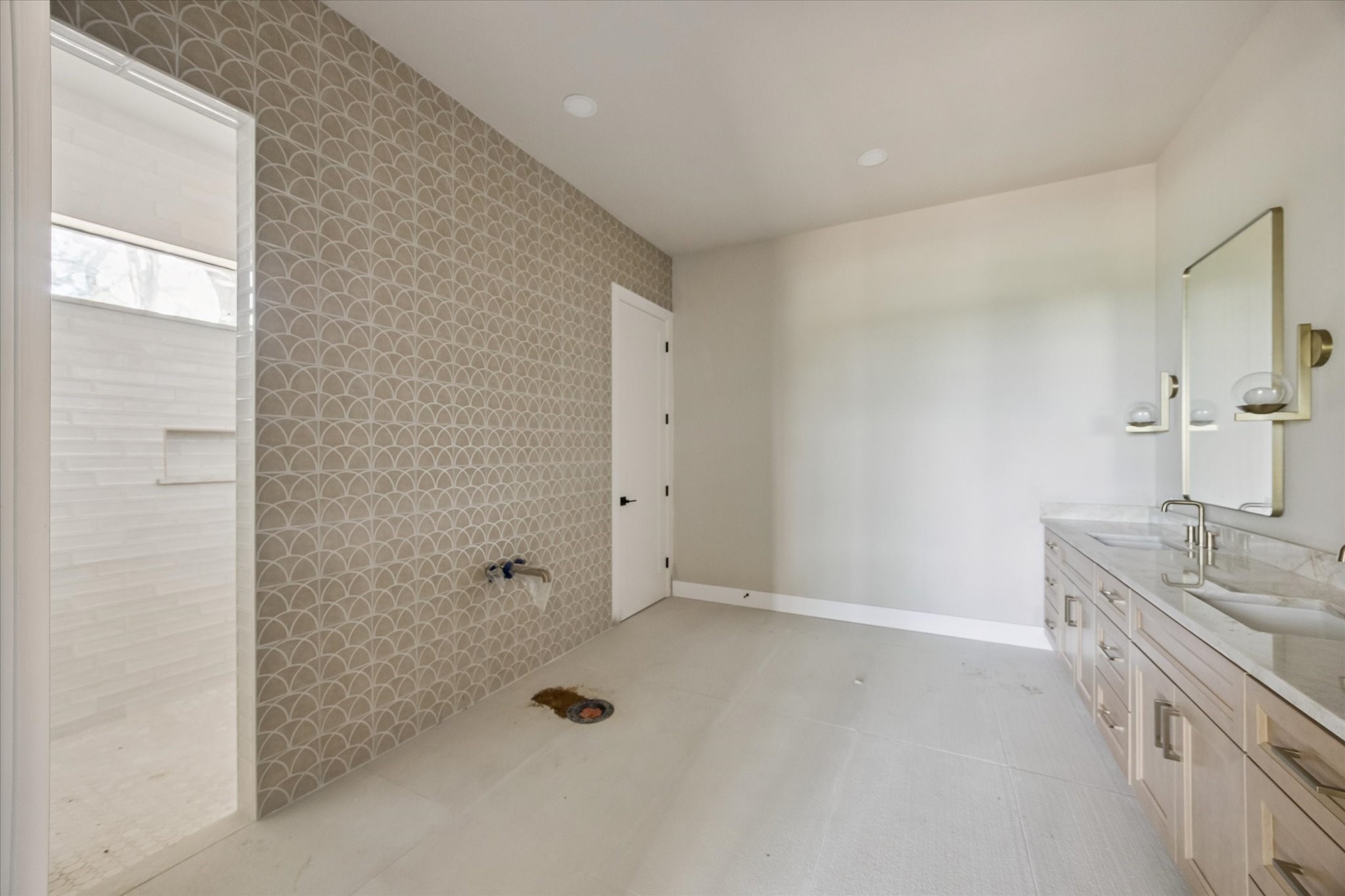 1 Windmill Ridge Brenham, TX 77833 - Photo 13 of 29 a bathroom with a granite countertop sink a toilet and shower