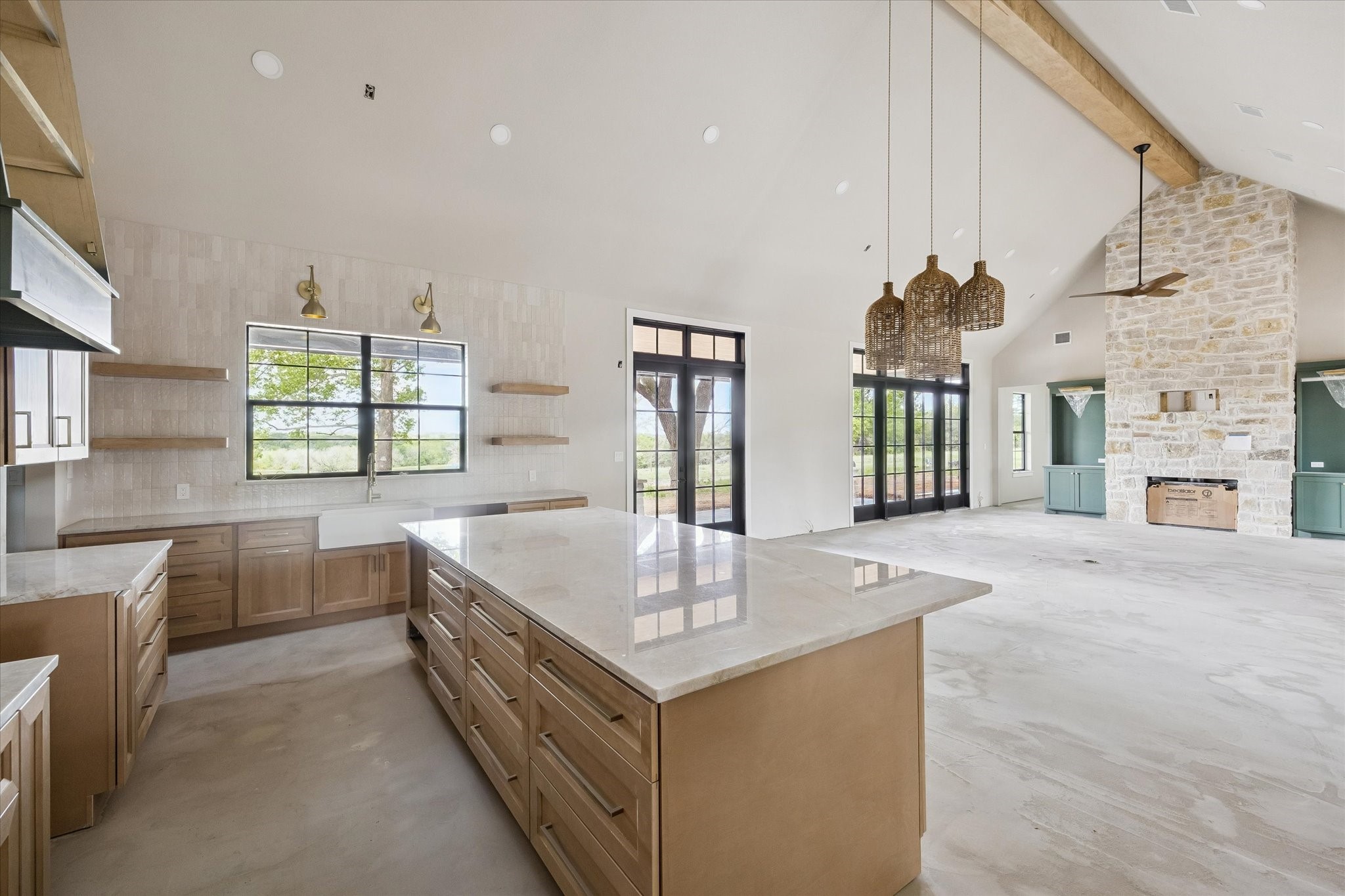 1 Windmill Ridge Brenham, TX 77833 - Photo 9 of 29 a kitchen with stainless steel appliances granite countertop a sink stove and cabinets