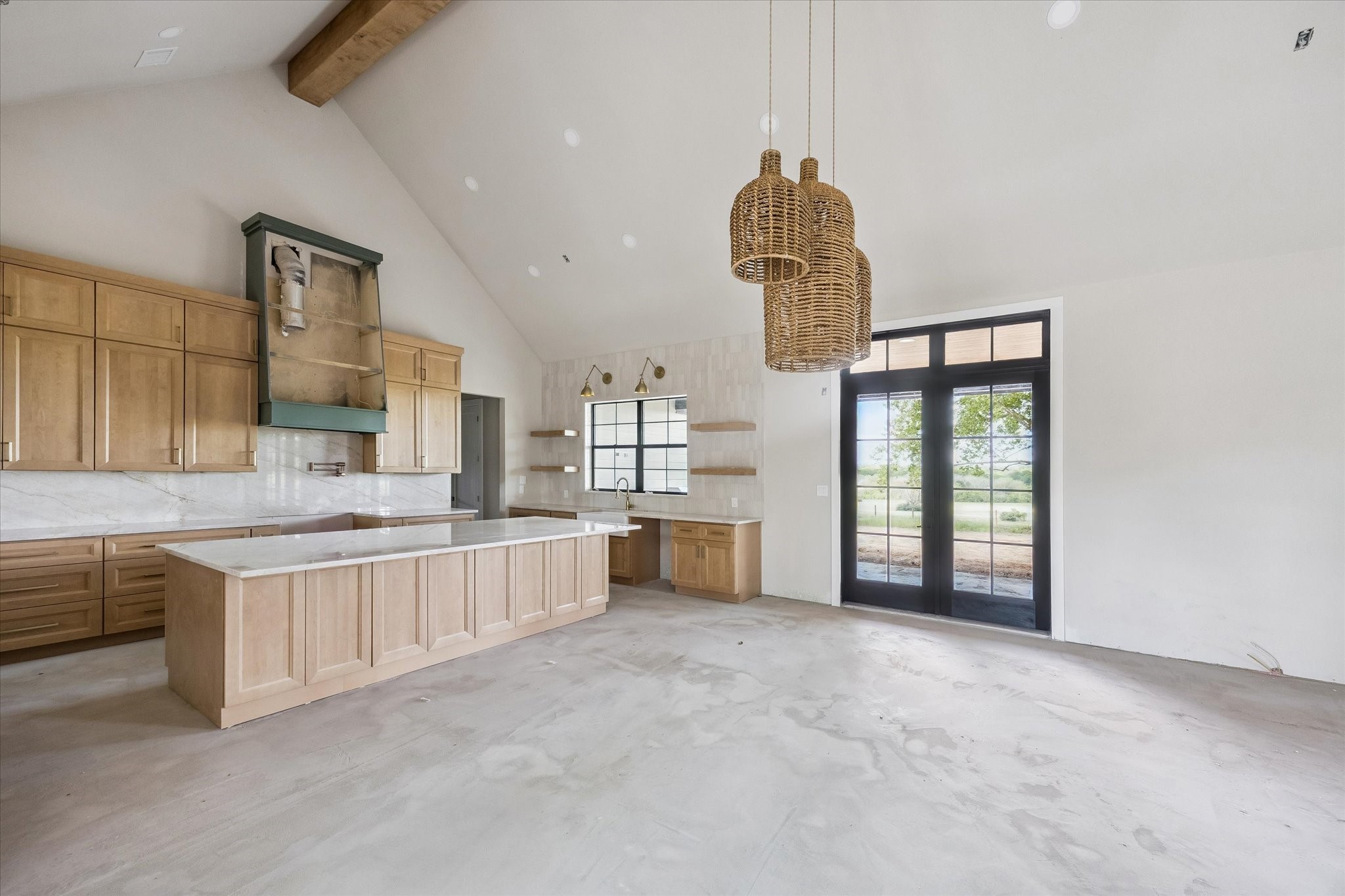1 Windmill Ridge Brenham, TX 77833 - Photo 10 of 29 a large white kitchen with a large window