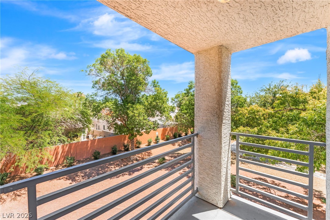 3318 North Decatur Boulevard, Unit 2152 Las Vegas, NV 89130 - Photo 21 of 58 Enjoy views of verdant trees and open skies from this elevated outdoor space.