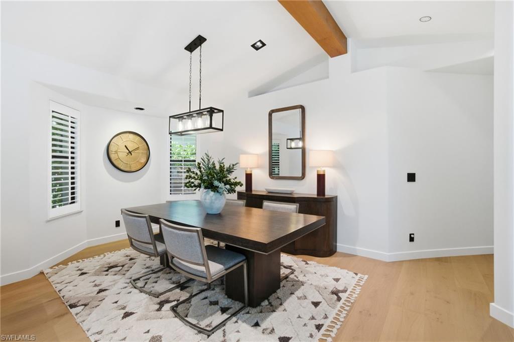 1506 Jewel Naples, FL 34102 - Photo 15 of 49 a dining room with table and chair