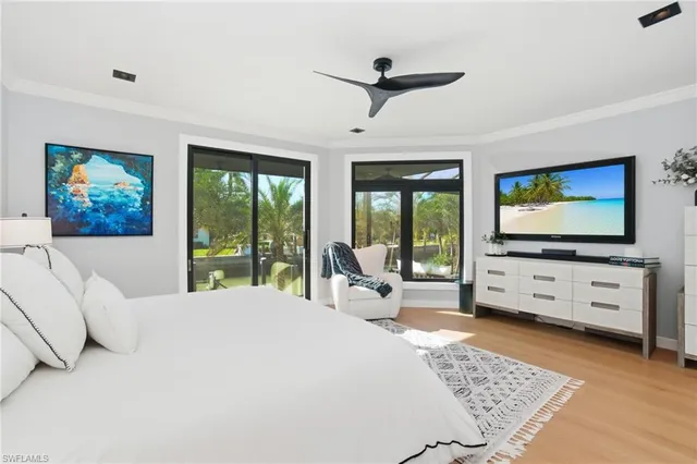 a bathroom with a double vanity sink a mirror and shower