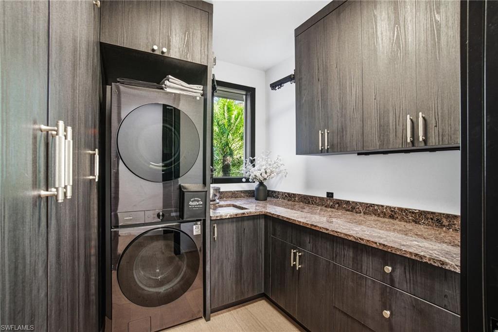 1506 Jewel Naples, FL 34102 - Photo 26 of 49 a utility room with sink dryer and washer
