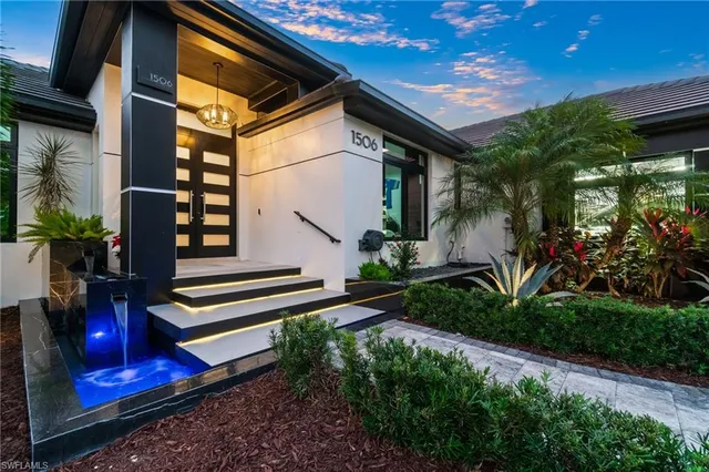 a house view with a backyard space