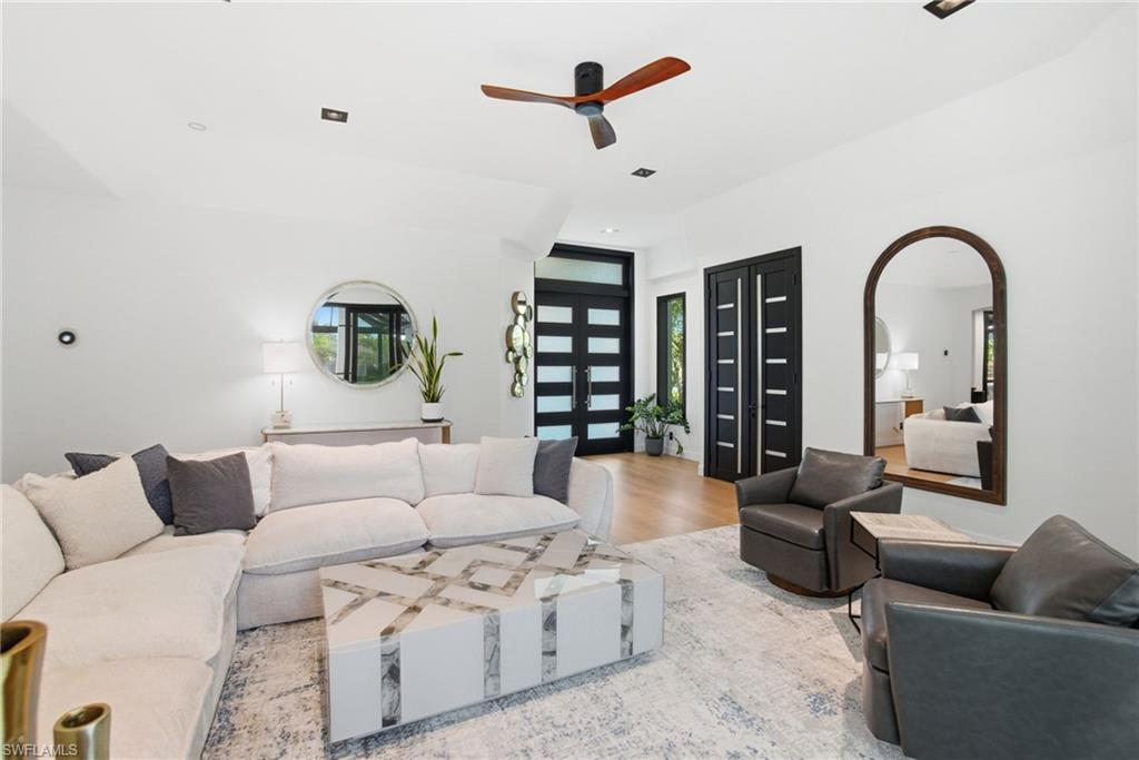 1506 Jewel Naples, FL 34102 - Photo 9 of 49 a living room with furniture
