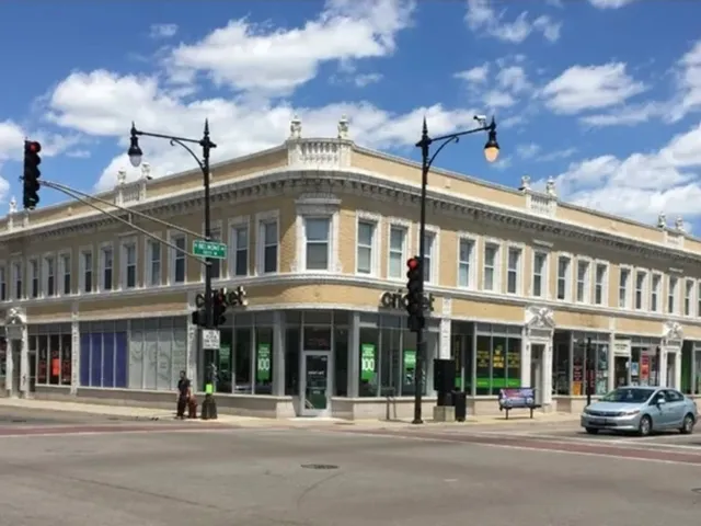 a view of a building with a street