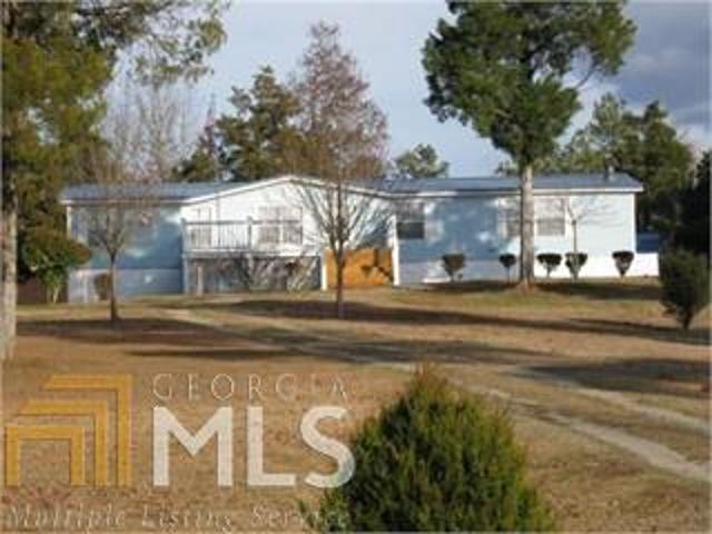 502 Bartram Trace Road Washington, GA 30673 - Photo 1 of 1 a view of a house with a yard