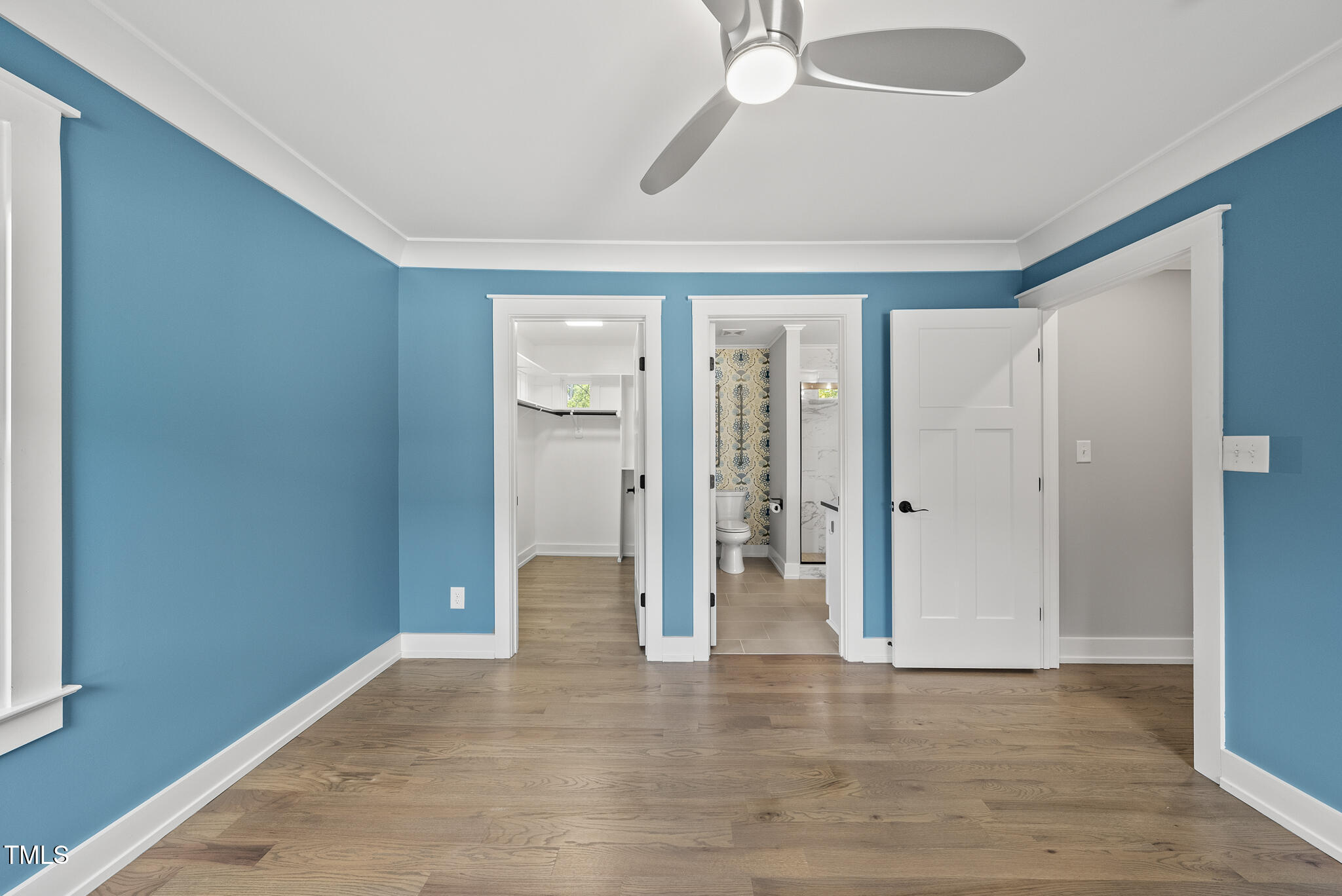 1529 Battery Drive Raleigh, NC 27610 - Photo 16 of 34 a view of empty room with wooden floor