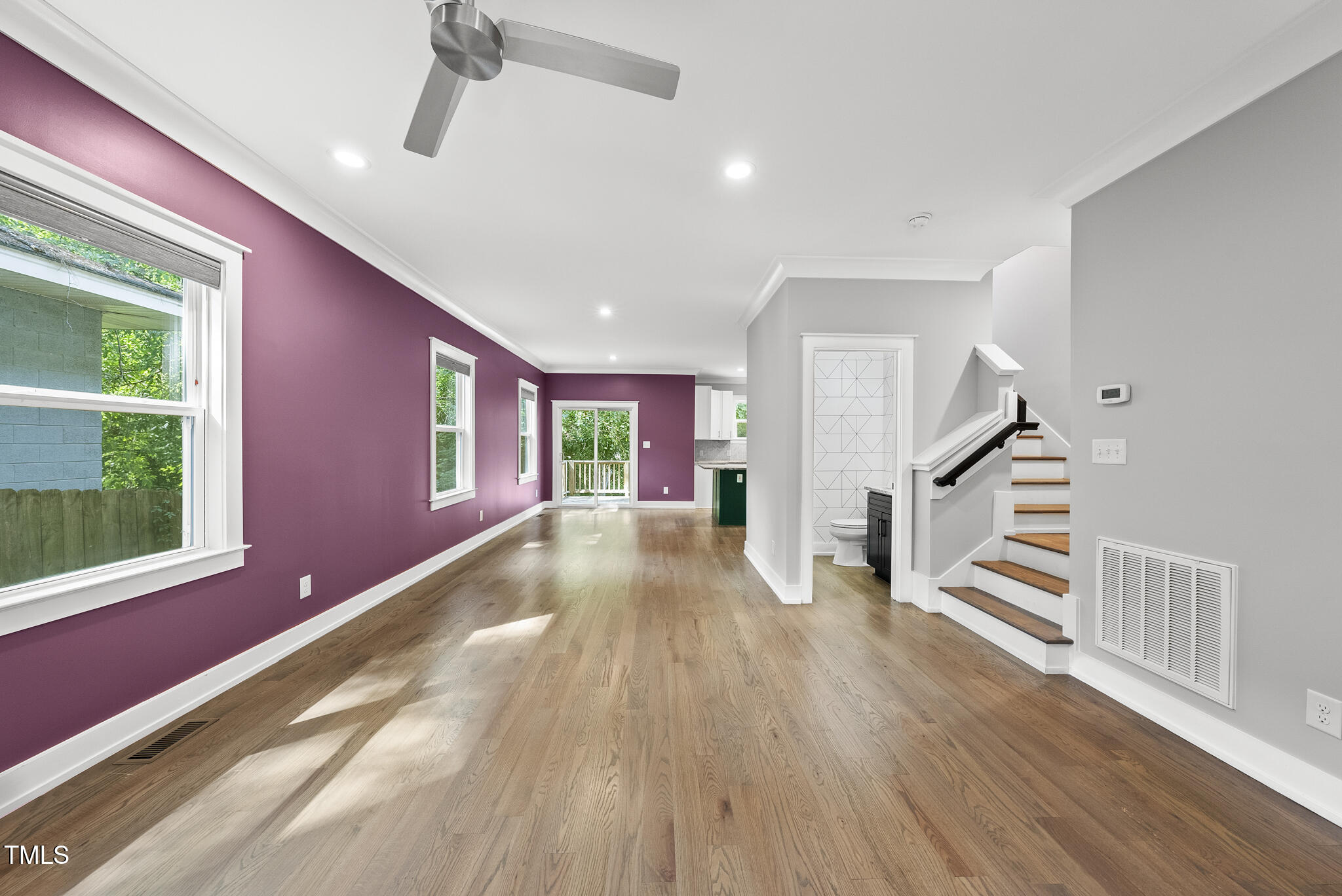 1529 Battery Drive Raleigh, NC 27610 - Photo 6 of 34 a view of an entryway with wooden floor and stairs