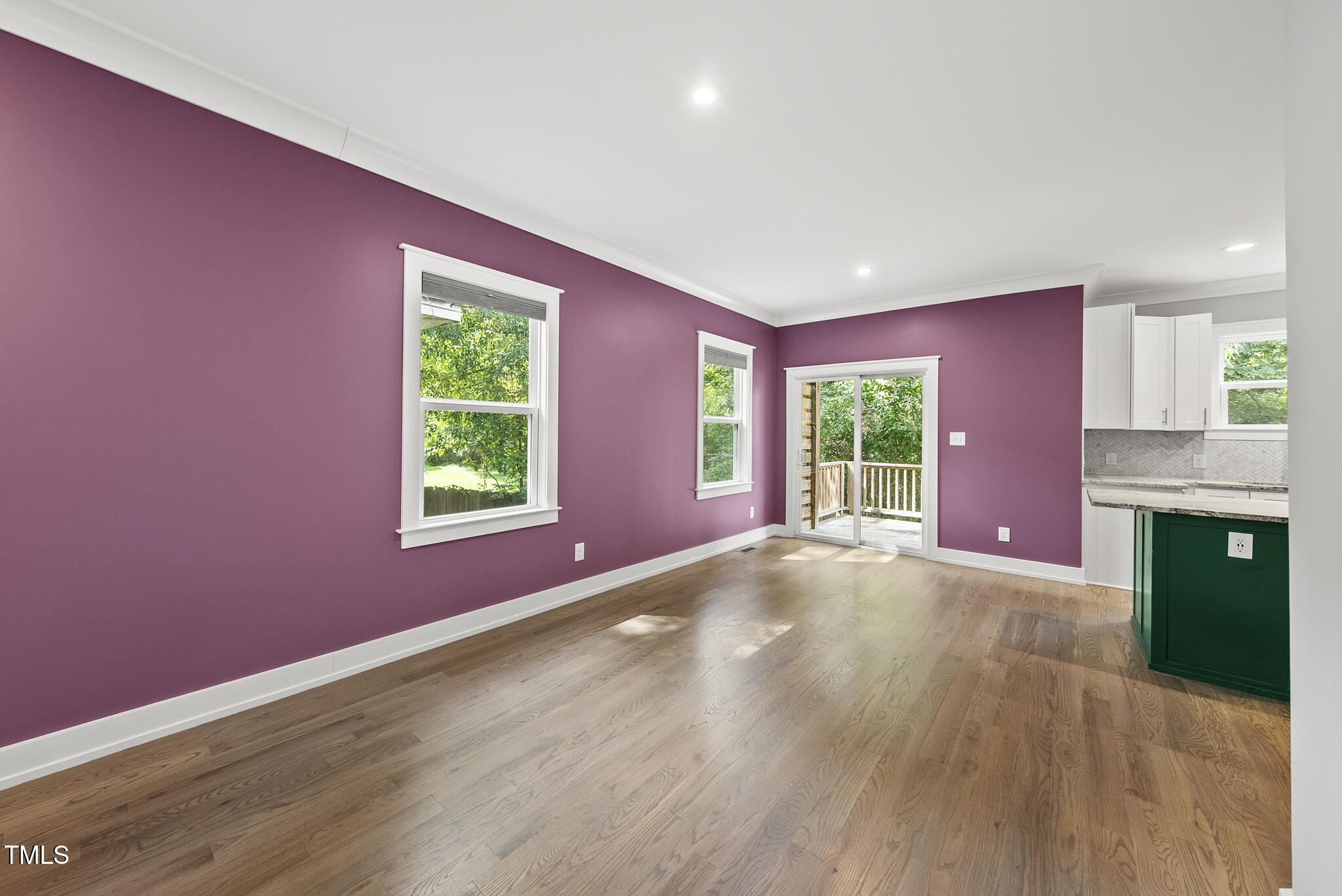 1529 Battery Drive Raleigh, NC 27610 - Photo 7 of 34 a empty room with a fireplace and window