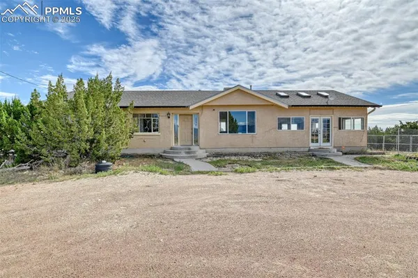 front view of house with a yard