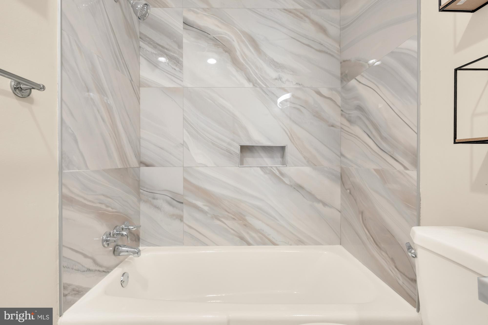 7056 Eastern Avenue Northwest, Unit 107 Washington, DC 20012 - Photo 28 of 36 Newly remodeled bathroom