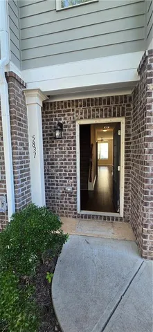 a front view of a house with yard