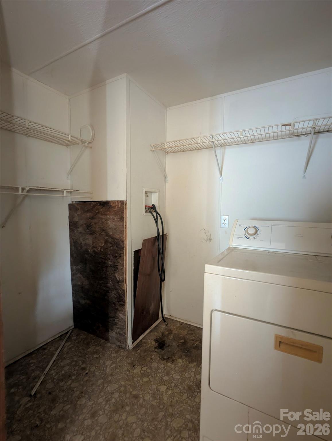 565 Jm Lovelace Road Ellenboro, NC 28040 - Photo 16 of 42 a utility room with dryer and washer