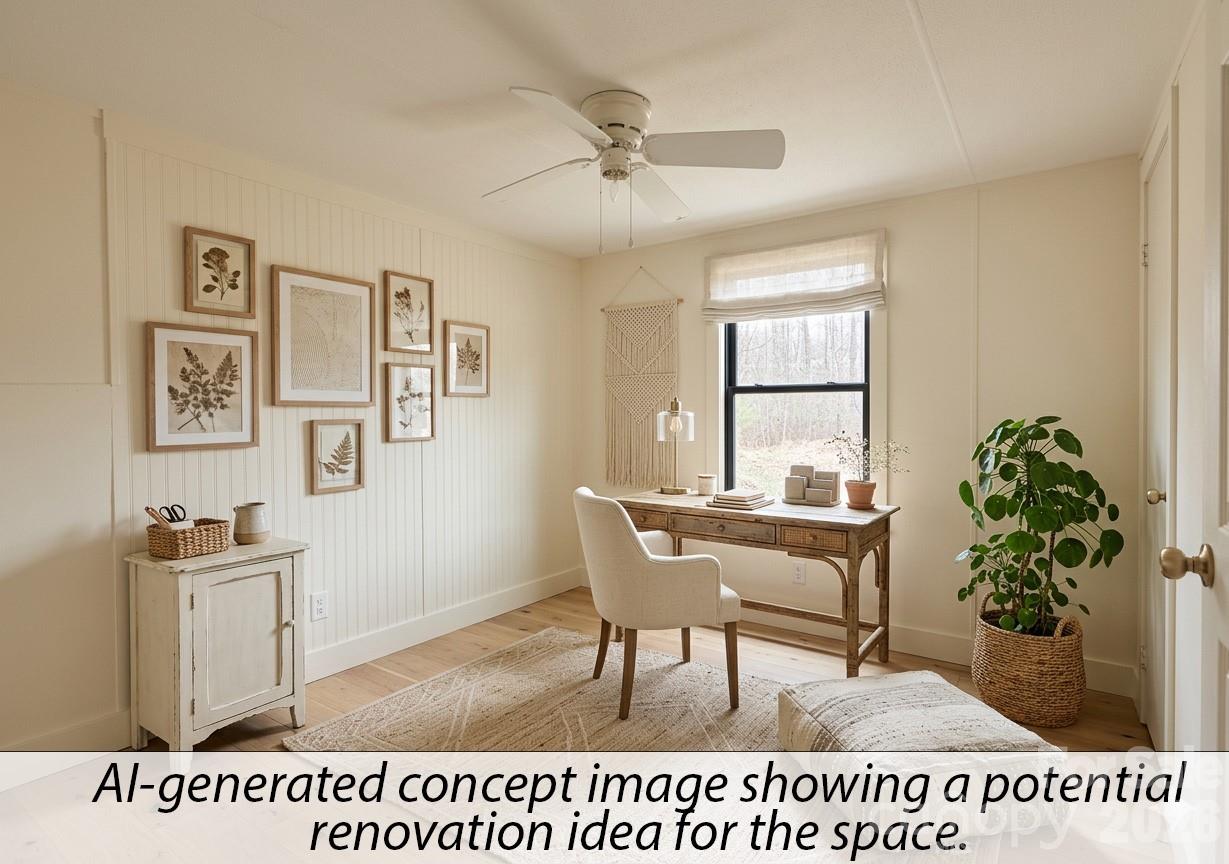 565 Jm Lovelace Road Ellenboro, NC 28040 - Photo 34 of 42 a living room with a table and a potted plant