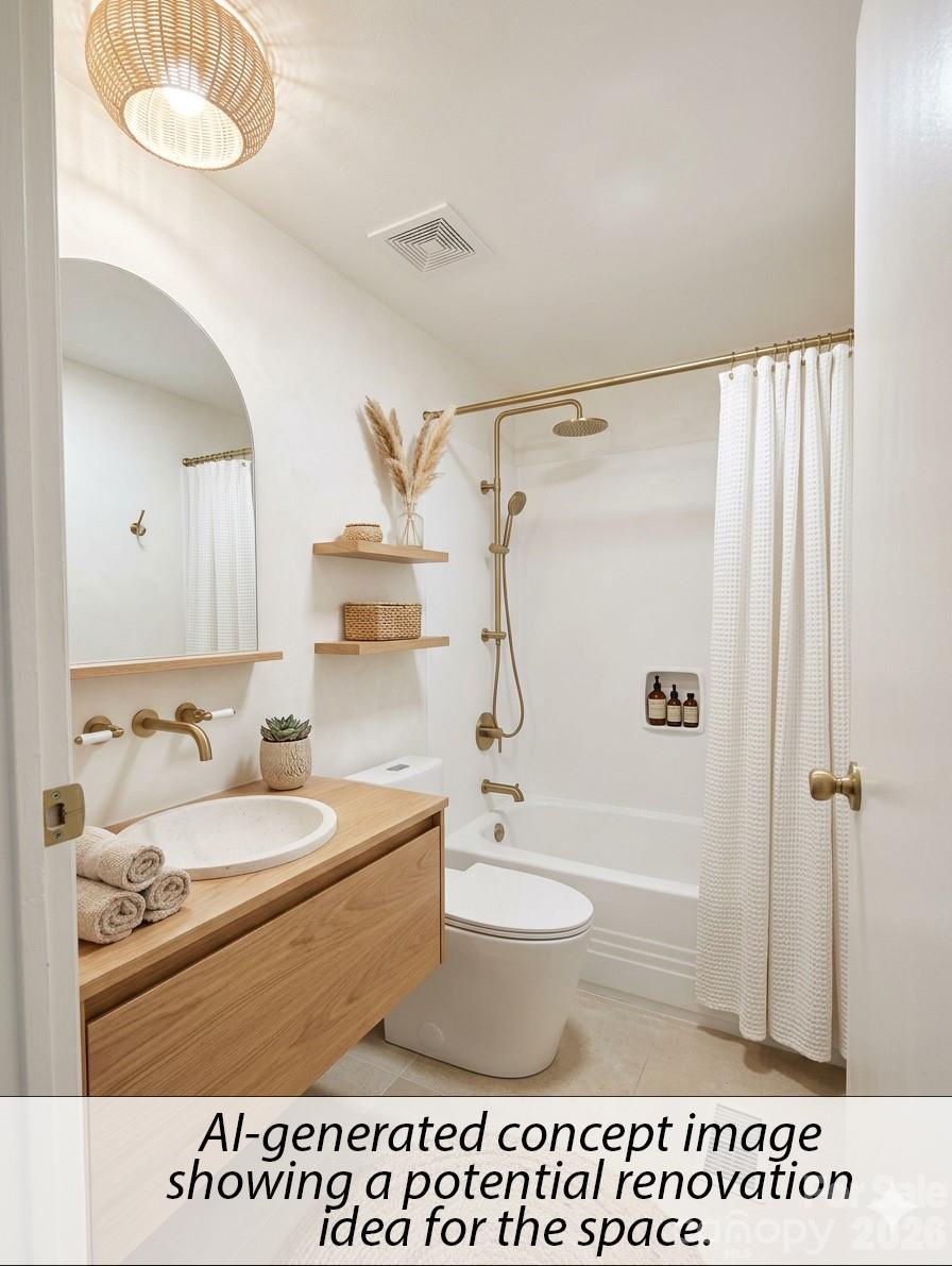 565 Jm Lovelace Road Ellenboro, NC 28040 - Photo 39 of 42 a bathroom with a sink a toilet and a mirror