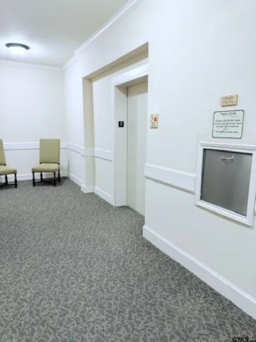 a view of a livingroom with furniture