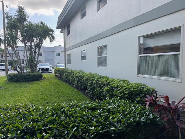 349 Flanders South Delray Beach, FL 33484 - Photo 24 of 26 a view of a house with a garden