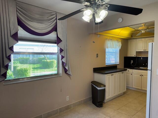 349 Flanders South Delray Beach, FL 33484 - Photo 5 of 26 a kitchen with a stove a sink and a microwave