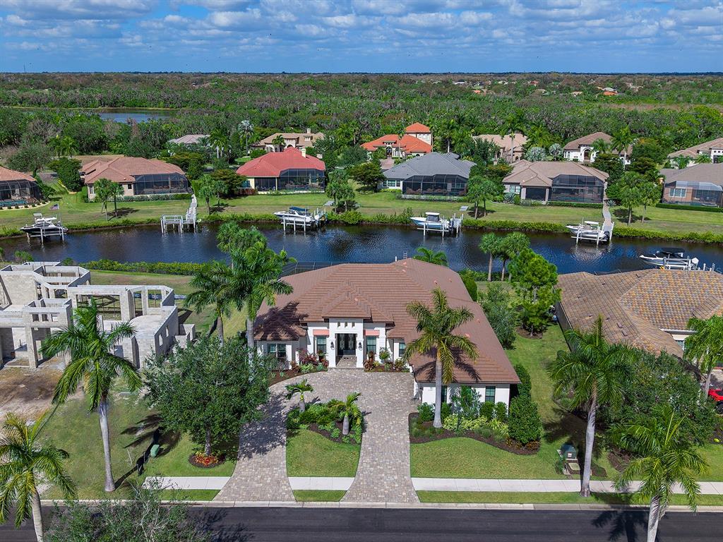 11708 Rive Isle Run Parrish, FL 34219 - Photo 2 of 65 an aerial view of multiple house
