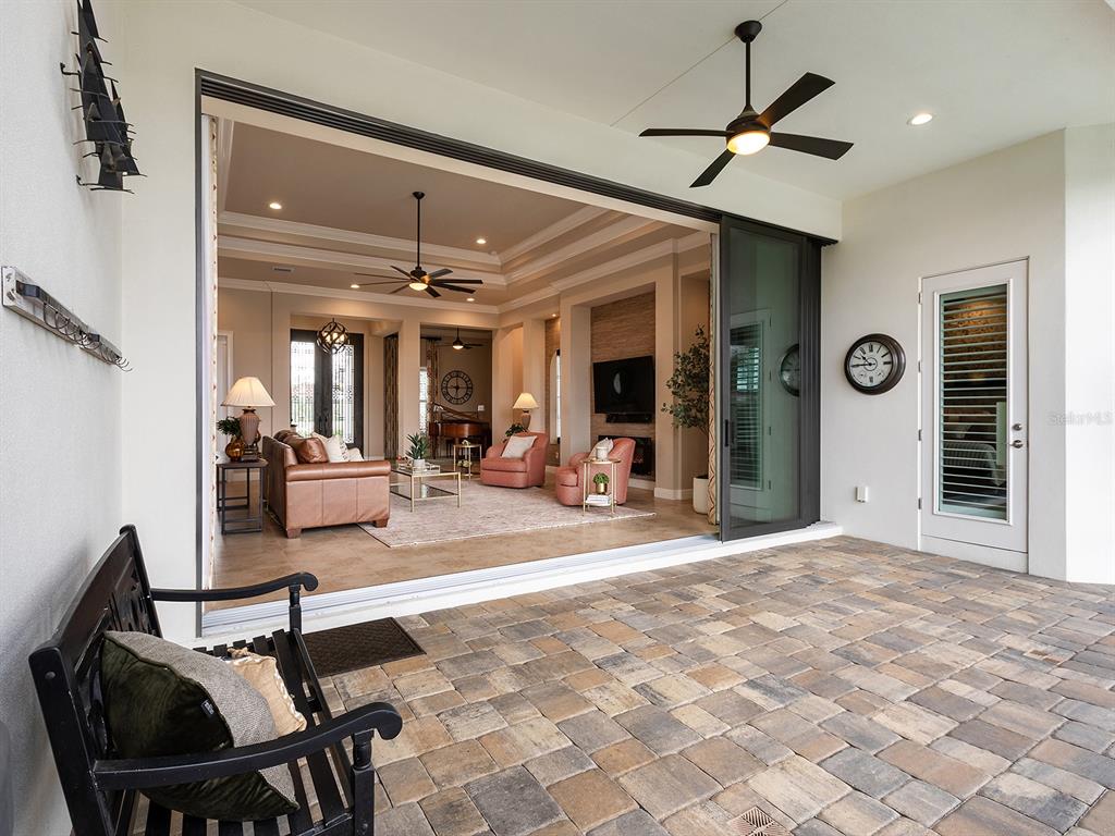 11708 Rive Isle Run Parrish, FL 34219 - Photo 41 of 65 a view of a livingroom with furniture and a ceiling fan