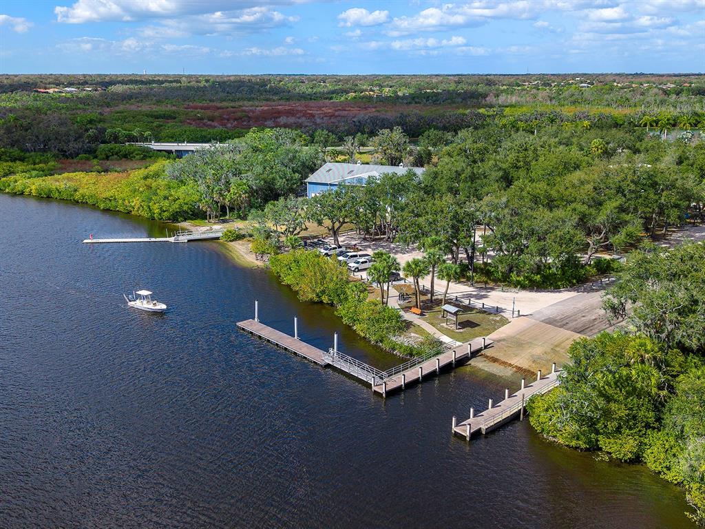 11708 Rive Isle Run Parrish, FL 34219 - Photo 61 of 65 an aerial view of a house with a yard