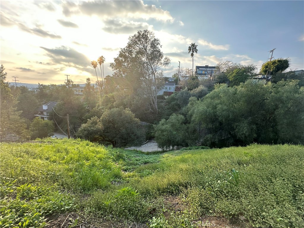 0 Sinclair Avenue Glendale, CA 91206 - Photo 11 of 14 a view of a green field with trees in the background