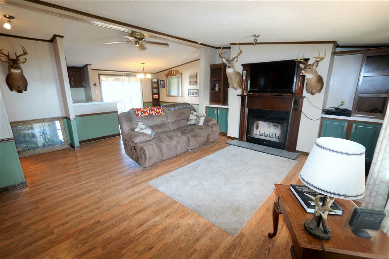 86 Middle Lane Road Grottoes, VA 24441 - Photo 28 of 50 a living room with furniture and a fireplace