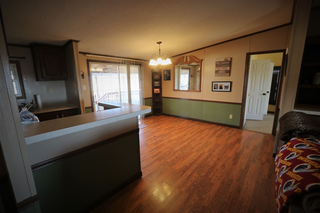 86 Middle Lane Road Grottoes, VA 24441 - Photo 32 of 50 a open kitchen with window and wooden floor