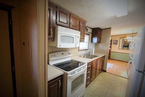 86 Middle Lane Road Grottoes, VA 24441 - Photo 38 of 50 a kitchen that has a sink and a stove in it