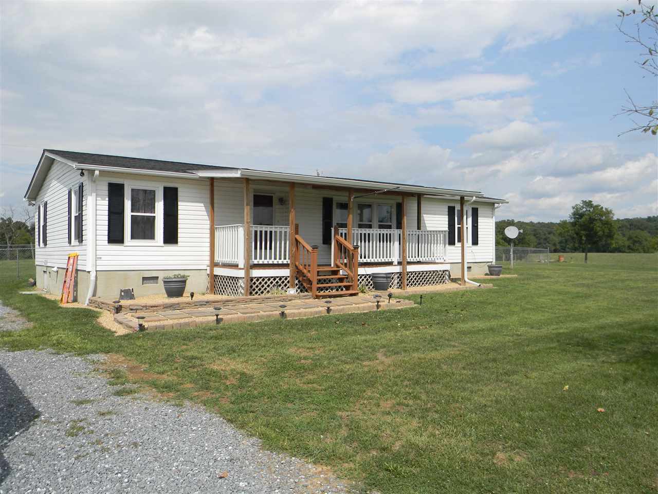 86 Middle Lane Road Grottoes, VA 24441 - Photo 7 of 50 a view of a house with backyard porch and sitting area