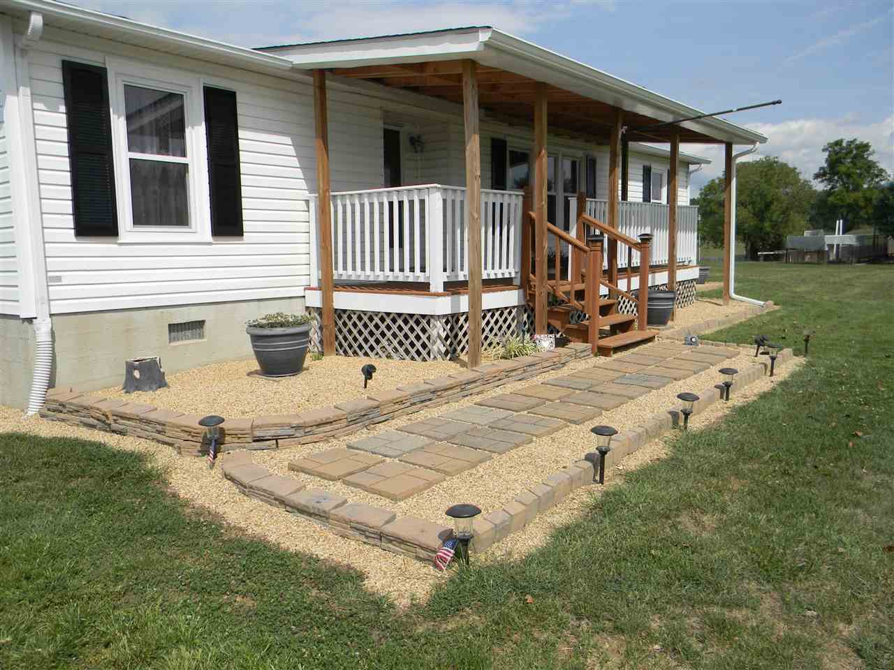 86 Middle Lane Road Grottoes, VA 24441 - Photo 8 of 50 a view of a house with backyard and porch
