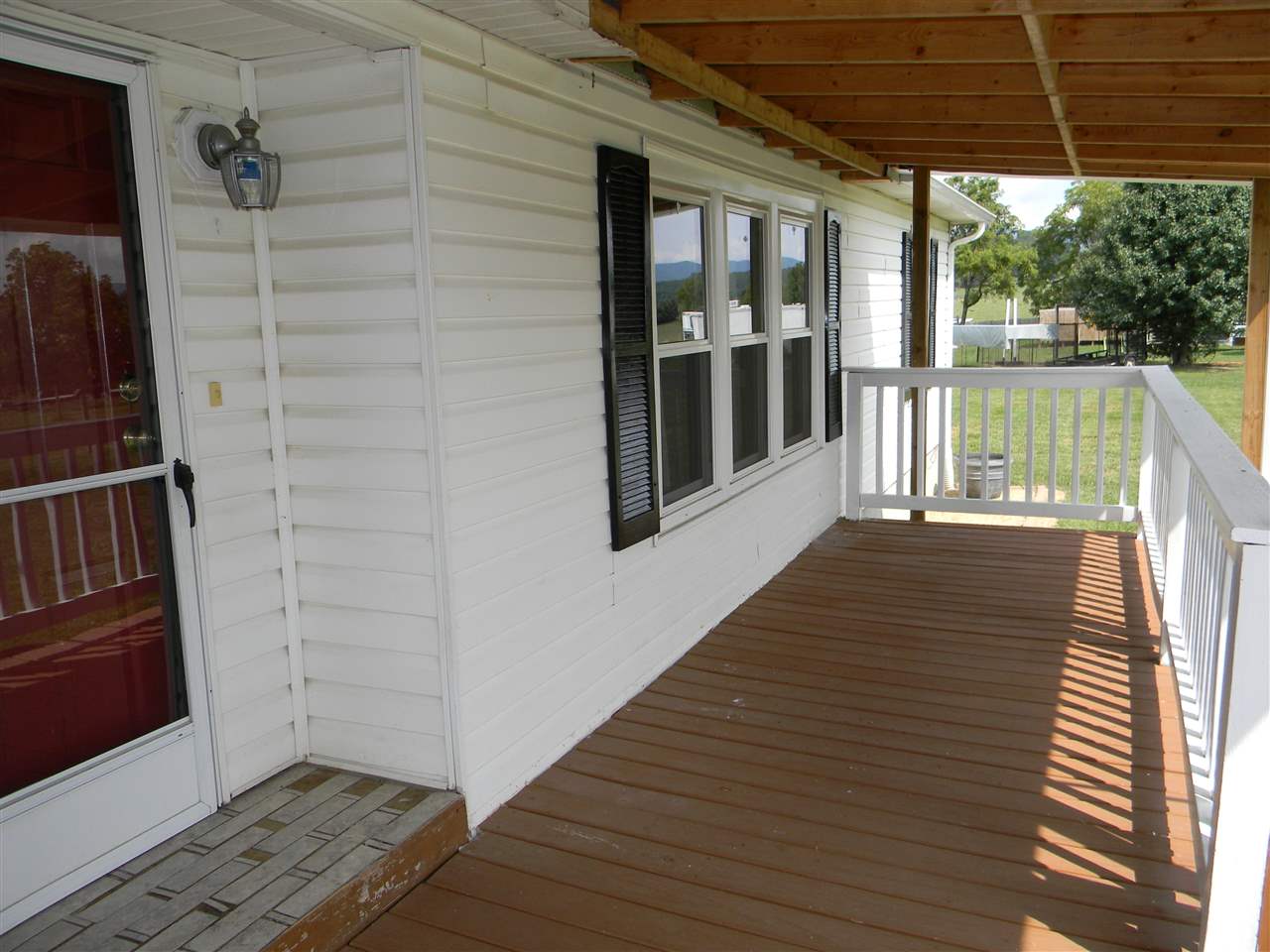 86 Middle Lane Road Grottoes, VA 24441 - Photo 9 of 50 a view of balcony with wooden floor