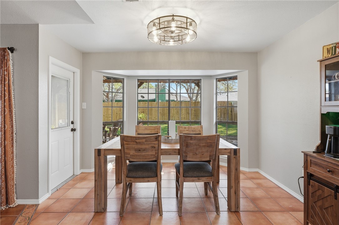 2169 Timberleaf Circle Ingleside, TX 78362 - Photo 15 of 36 a view of a dining room with furniture window and outside view